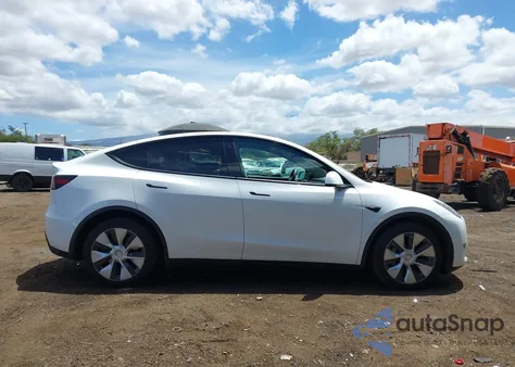 2023 Tesla Model Y Awd/Long Range Dual Motor All-Wheel Drive z USA, uszkodzony, nr VIN 7SAYGDEE1PF752864